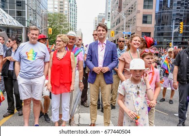 TORONTO, CANADA - JUNE 25, 2017: National Chief Perry Bellegard, Toronto Mayor John Tory, Ontario Premier Kathleen Wynne, Canadian Prime Minister Justin Trudeau, Sophie Grégoire Trudeau At Parade.