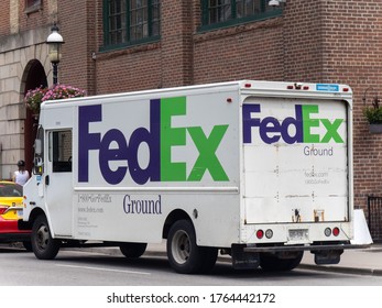 Toronto Canada, June 26, 2020; A White Canadian FedEx Ground Delivery Truck At St Lawrence Market