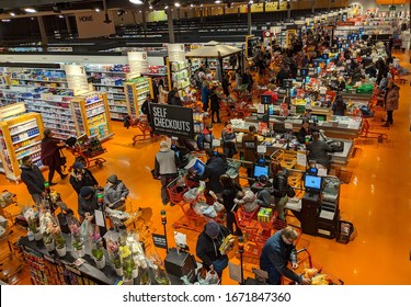 Toronto, Canada - Mar 12, 2020: Huge Long Line Ups Of Customers Crowds At Loblaws Supermarket Store, People Panic Buying Due To Corona Virus Covid 19 Outbreak Pandemic Crisis, View From Above. 