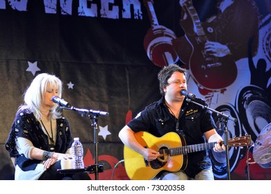 TORONTO, CANADA - MAR 12: Renowned singer/songwriters Emmylou Harris & Gordie Sampson perform at the Songwriter's Circle as part of Canadian Music Week on March 12, 2011 in Toronto, Ontario Canada.