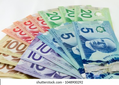 TORONTO CANADA - MARCH 18, 2018:  The Canadian dollar bills in $5, $10, $20, $50, and $100 denominations.