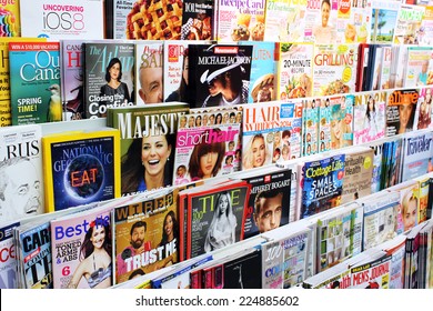 TORONTO, CANADA - MAY 07, 2014: Magazines on display in a store in Toronto, Ontario, Canada. There are more than 1300  English and French magazines that are published in Canada.