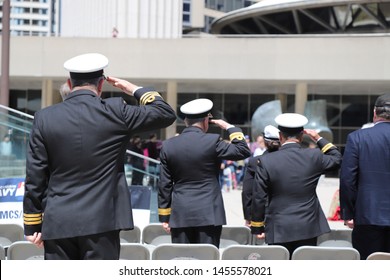 Toronto, Canada: May 2019 - Royal Canadian Navy Men Saluting InToronto City Centre