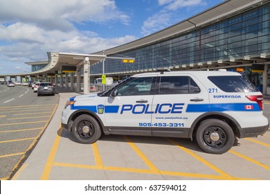 TORONTO, CANADA- MAY 7, 2017: Police car at pickup area of Toronto Pearson Airport on May 7, 2017 in Toronto, Canada. Pearson is the largest and busiest airport in Canada
