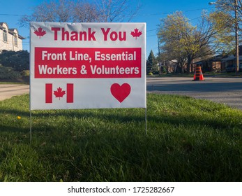 Toronto, Canada - May 7, 2020: Thank You Front Line, Essential Workers And Volunteers Sign With Anadian Flag And Maple Leafs During Corona Virus Outbreak. Selective Focus.