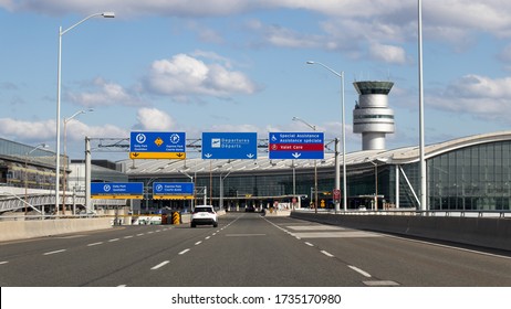 TORONTO, CANADA - May 7, 2020: Near empty road entrance to Terminal 1 departures at Toronto Pearson Intl. Airport amid the COVID-19 (Coronavirus) pandemic. 