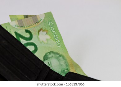 TORONTO CANADA - NOV 18, 2019: Canadian $20 Dollar Bills On A Wallet, Canadian Money