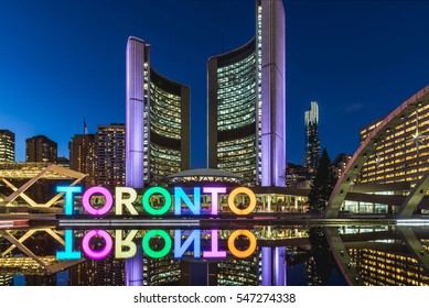 TORONTO, CANADA - NOVEMBER 11, 2016: Nathan Phillips Square lit up as night comes on in Toronto, Canada.