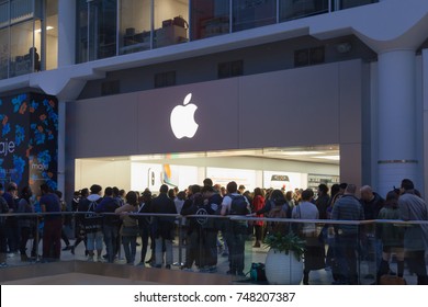 TORONTO, CANADA - November 3, 2017: People line up to buy new iPhone at the Apple store in Eaton Centre, Toronto, Canada
