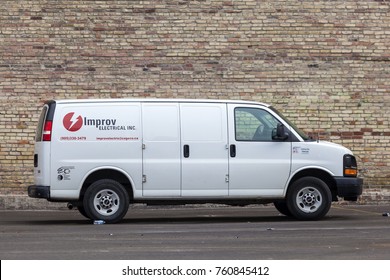 Toronto, Canada - Oct 14, 2017: A White GMC Cargo Van Parked On A Parking Lot In The City Of Toronto, Canada