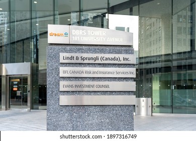 Toronto, Canada - October 13, 2020: Lindt And Sprungli Canada, BFL Canada, Evans Invesment Counsel Company Sign On The Ground Directory Sign Outside DBRS Tower On University Ave. In Toronto. 