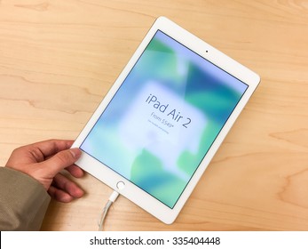 TORONTO, CANADA - OCTOBER 14, 2015:  Customer Hands On The New IPad Air 2 At The Apple Store.