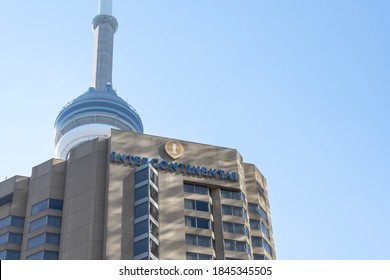 Toronto, Canada - October 28, 2020: Intercontinental Hotel Sign Is Seen With CN Tower In Background In Toronto. InterContinental Hotels Group Plc Is A British Multinational Hospitality Company. 