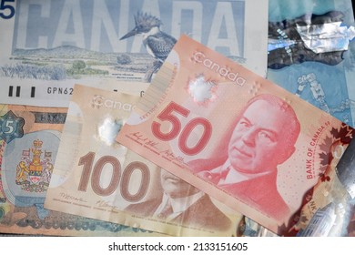 Toronto, Canada - October 30. 2021: One Hundred And Fifty Canadian Dollar Banknotes. Canadian Money Cash