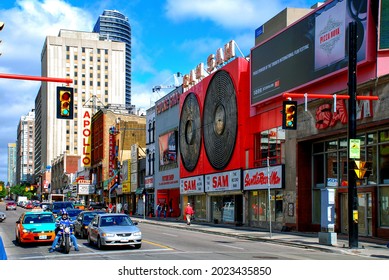 Toronto, Canada - September 15, 2005: Replica Marquee for The NY Apollo Theater for the filming of The Incredible Hulk and the flagship Sam the Record Man store on Yonge St with its iconic neon sign 