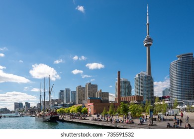 TORONTO, CANADA - SEPTEMBER 2013 - People enjoying beautiful sunny afternoon near lake Ontario in Toronto
