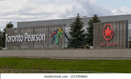 TORONTO, CANADA - September 26, 2019:  Toronto Pearson and Air Canada logo on billboards alongside Highway 401.