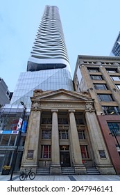 Toronto, Canada - September 26, 2021:  To Preserve Heritage Architecture, This Modern Apartment Building Incorporates An Old Bank Building, Using It As Its Entrance Lobby.