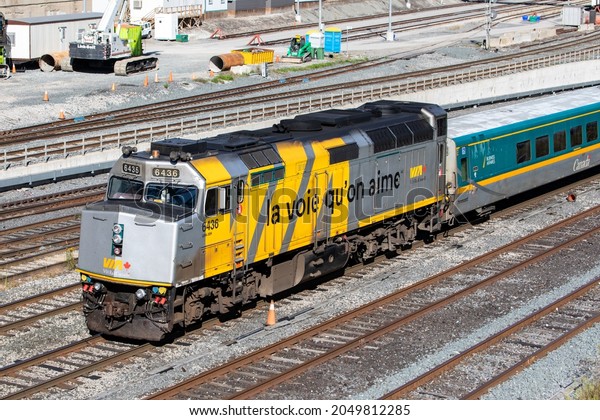 Toronto, Canada,\
September 29, 2021; A Canadian passenger railway diesel locomotive\
6436 showing the French slogan \