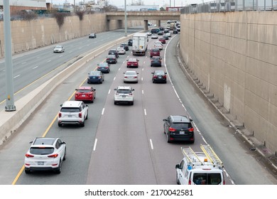 Toronto, Canada-June 2022:Urban Transportation - Rush Hour Traffic Of Cars And Trucks On A City Divided Roads. Metropolis Activity Heading Towards An Overpass. Traffic Jam Of Vehicle Transportation.