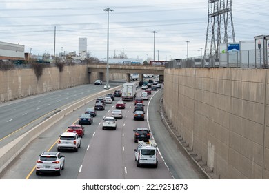 Toronto, Canada-Oct 2022:Urban Transportation - Rush Hour Traffic Of Cars And Trucks On A City Divided Roads. Metropolis Activity Heading Towards An Overpass. A Traffic Jam Of Vehicle Transportation.