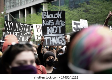 Toronto, Canda, May 30, 2020: 'Not Another Black Life' Protest. Protest Against Police Brutality. Black Lives Matter Toronto. 'Black Kids Are Not Thugs' Sign