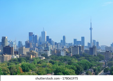 Toronto City Skyline View With Park And Urban Buildings