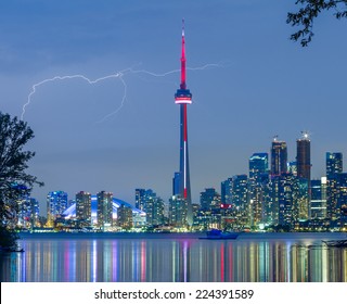  Toronto Downtown Skyline at night with lightning - Powered by Shutterstock