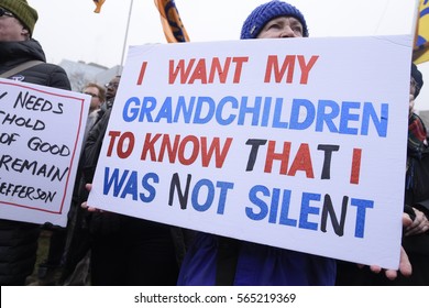 TORONTO- JANUARY 21: An old aged protestor giving a reason in her sign to speak up  during the "Women's March on Washington" to protest against Trump presidency on January 21, 2017 in Toronto, Canada.