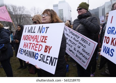 TORONTO - JANUARY 21:An Old Woman With A Sign Explaining Her Reason To Speak Up  During The 