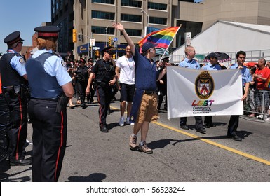 TORONTO - JULY 04: OPP, RCMP, Regional, Toronto, York And Durham Police Are Represented At Pride Parade In Toronto, July 04, 2010