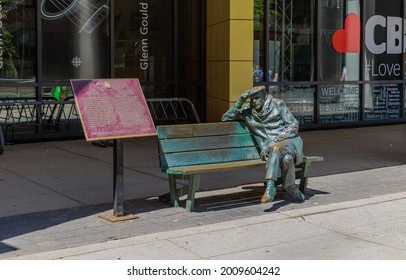 Toronto, June 12, 2021 Ruth Abernathy's Bronze Sculpture of the Famous Canadian Pianist Glenn Gould Seated on a Park Banch Outside the Glenn Gould Studio at the Canadian Broadcasting Centre.