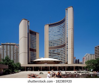 TORONTO - JUNE 14, 2002: New City Hall With Two Curved Towers (arch. Viljo Revell) Was Open On Nathan Phillips Square In 1965. Square With Public Activity Become The Heart Of Important Ontario's City.