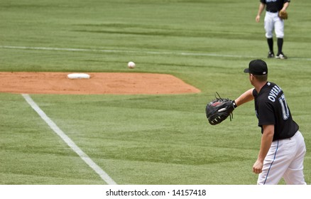 TORONTO - JUNE 14:  Lyle Overbay #17 Catches A Ball During The Chicago Cubs Vs. Toronto Blue Jays Game At The Rogers Centre June 14, 2008 In Toronto, Ontario.  Chicago Won 6-2.