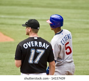 TORONTO - JUNE 14:  Lyle Overbay #17 And Ronny Cedeno #5 Talk During The Chicago Cubs Vs. Toronto Blue Jays Game At The Rogers Centre June 14, 2008 In Toronto, Ontario.  Chicago Won 6-2.