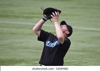 TORONTO - JUNE 14:  Lyle Overbay #17 Catches A Pop Up During The Chicago Cubs Vs. Toronto Blue Jays Game At The Rogers Centre June 14, 2008 In Toronto, Ontario.  Chicago Won 6-2.