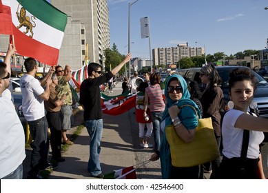 TORONTO - JUNE 26: Iranian Diaspora demonstrating about the regime and the political situation in Iran on Yonge Street on June 26, 2009 in Toronto, Canada.