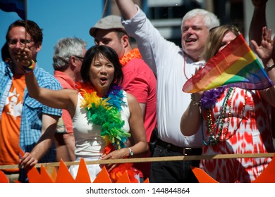 TORONTO - JUNE 30: Canada's Member Of Parliament, Olivia Chow Joins The Parade. Over Half A Million People Gather To Watch The 33rd Annual Pride Parade In Toronto On June 30, 2013.