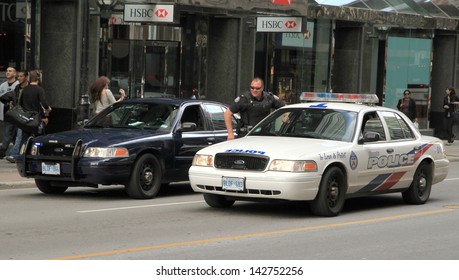 TORONTO - JUNE 8: Toronto Police Cars On June 8, 2013 In Toronto. The Toronto Police Service Has Approximately 5,400 Uniformed Officers And 2,500 Civilian Employees.