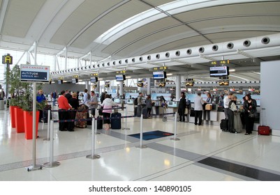 TORONTO - MAY 10: Passengers waiting to check-in on May 10, 2013 in Toronto. Pearson is the largest and busiest airport in Canada, and is one of the world's largest air transportation hubs.