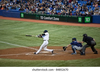 TORONTO - MAY 19: Toronto Blue Jays' Player Jose Bautista At Bat In A MLB Game Against The Tampa Bay Rays At Rogers Centre On May 19, 2011 In Toronto. Toronto Won 3-2.