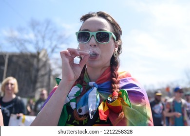 TORONTO - MAY 5:   A Teen Age Girl Smoking Recreational Marijuana During The  Annual Global Marijuana March On May 5  2018 In Toronto, Canada.