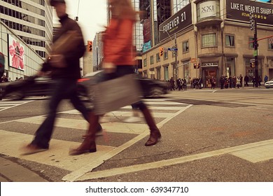 Toronto, May 7, 2017: Business People Walking On A Busy, Crowded Street In Toronto Downtown, Ontario, Canada 