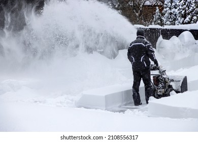 Toronto, North America, Snow Cleanup And Snow Removal Of The Streets After Snowstorm Blizzard That Resulted In Public Transit Delays, Flight Cancellation, Roadblocks And School Delays.