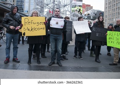 TORONTO - NOVEMBER 22: Men And Women Of All Ages And Religion Standing Together During A Solidarity Rally To Welcome Syrian Refugees To Canada  On November 22, 2015 In Toronto,Canada.