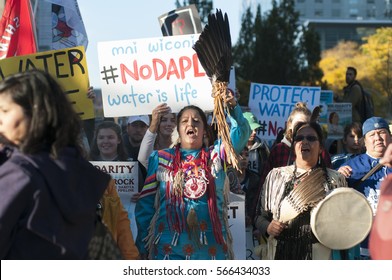 TORONTO - NOVEMBER 5: Indigenous Community Members Walking While Chanting Slogans During A Solidarity Rally With The Dakota Access Pipeline Protesters On November 5, 2016 In Toronto, Canada.