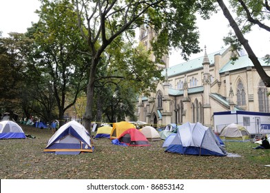 TORONTO - OCTOBER 17: Temporary tents set up  at the St. James Park during the Occupy Toronto Movement on October 17, 2011 in Toronto, Canada.