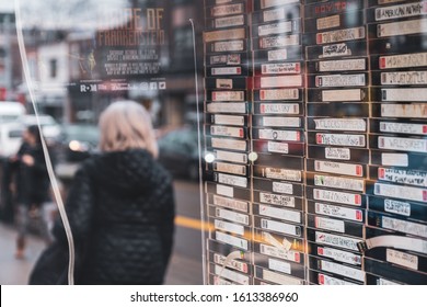 Toronto, ON Canada 12/27/2019: Stack Of VHS Tapes In Store Window In The Roncesvalles Neighbourhood. 