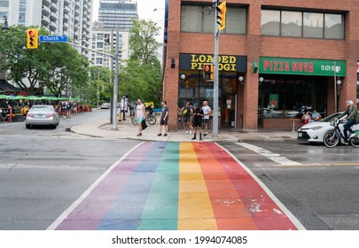 Toronto, ON Canada - June 13 2021: Gay Pride Flag Painted On The Sidewalk And Crosswalk Of The Street In Toronto, Ontario Canada. Church Street Rainbow On The Ground In The Village.