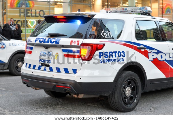 Toronto, ON, Canada - JUNE 21, 2019: Police car
during the demonstration of the street of Toronto at Trans March
and Pride Month.